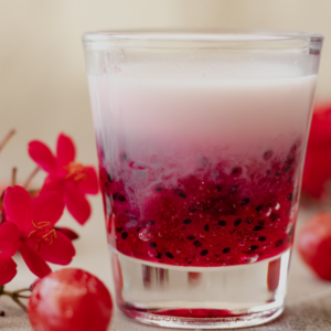 red liquid in clear drinking glass